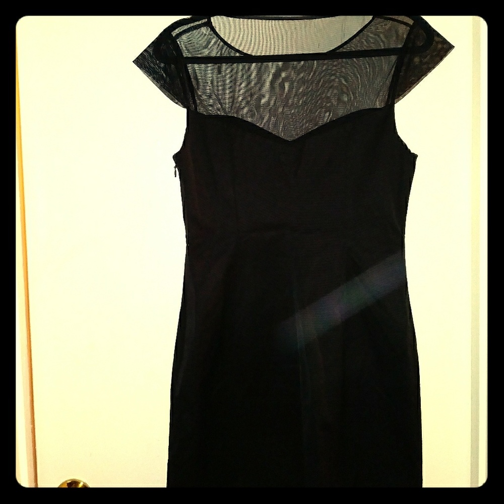 Clean simple black dress